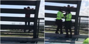 Policías salvan a mujer que se iba a lanzar de un puente _ Foto_ captura video