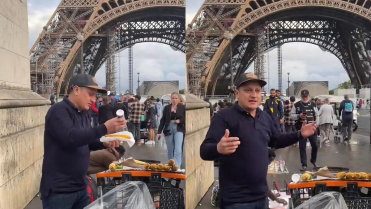 Hombre vende mazorcas al lado de Torre Eiffel